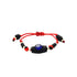 The Genuine Azabache Bracelet for Baby with Blue Evil Eye Peonia is handcrafted, showcasing a blue evil eye bead at its center for spiritual protection, surrounded by black and red beads. It is strung on an adjustable red rope with black and red accents at the ends.